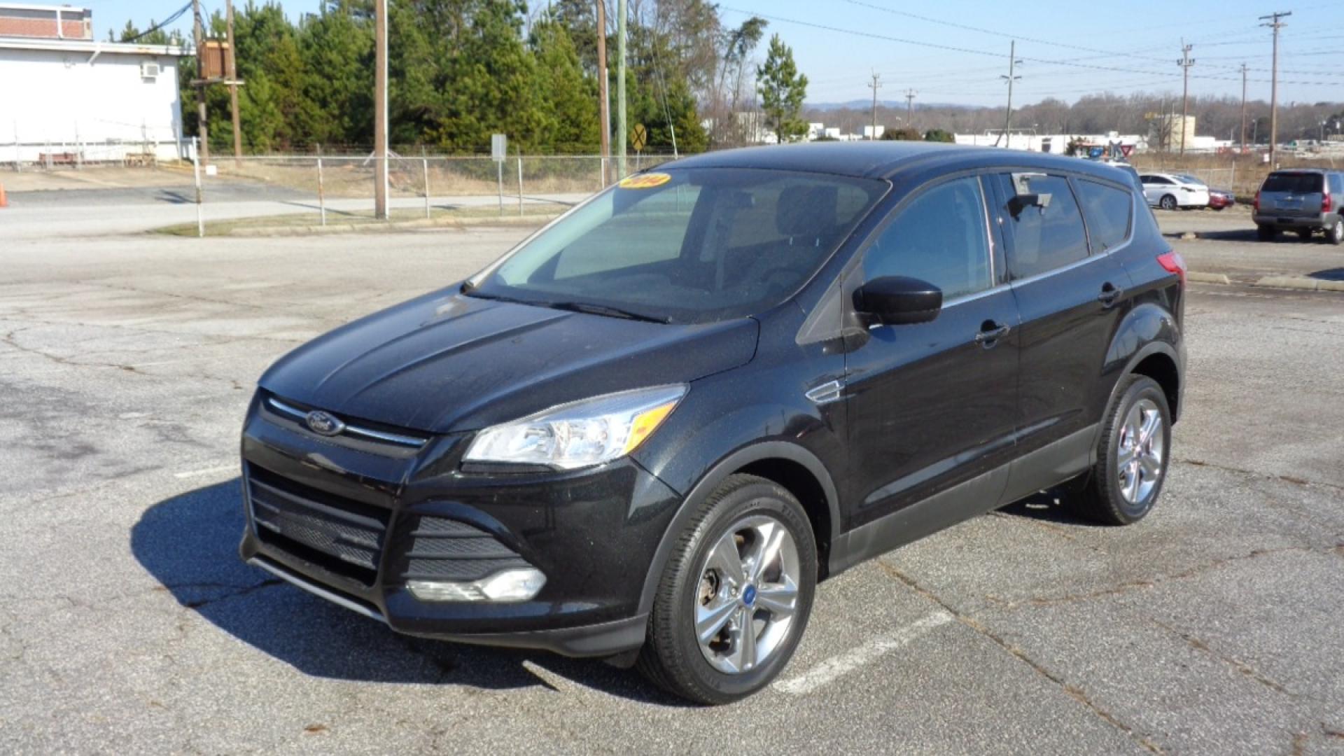 2014 BLACK /TAN Ford Escape SE 4WD (1FMCU9GX0EU) with an 1.6L L4 DOHC 16V engine, 6-Speed Automatic transmission, located at 2812 White Horse Road, Greenville, SC, 29611, (864) 269-1711, 34.808655, -82.434776 - Photo#0