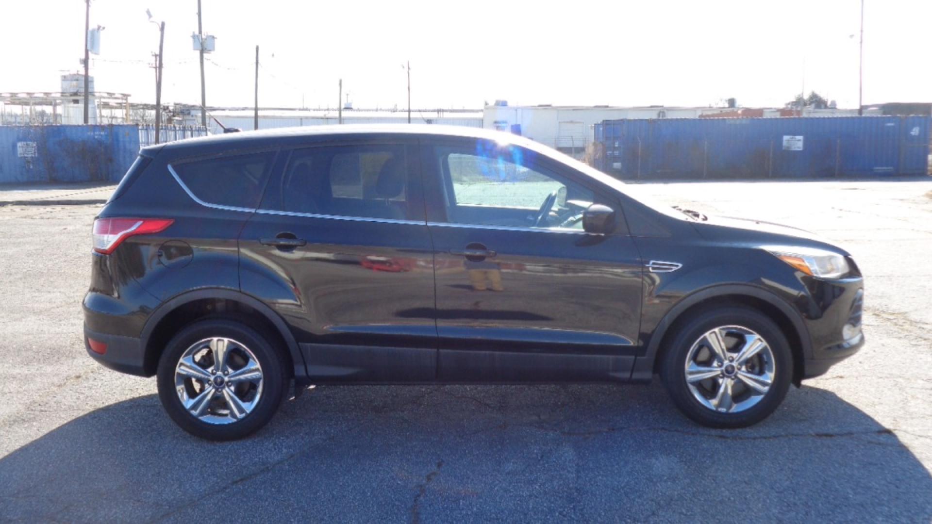 2014 BLACK /TAN Ford Escape SE 4WD (1FMCU9GX0EU) with an 1.6L L4 DOHC 16V engine, 6-Speed Automatic transmission, located at 2812 White Horse Road, Greenville, SC, 29611, (864) 269-1711, 34.808655, -82.434776 - Photo#2