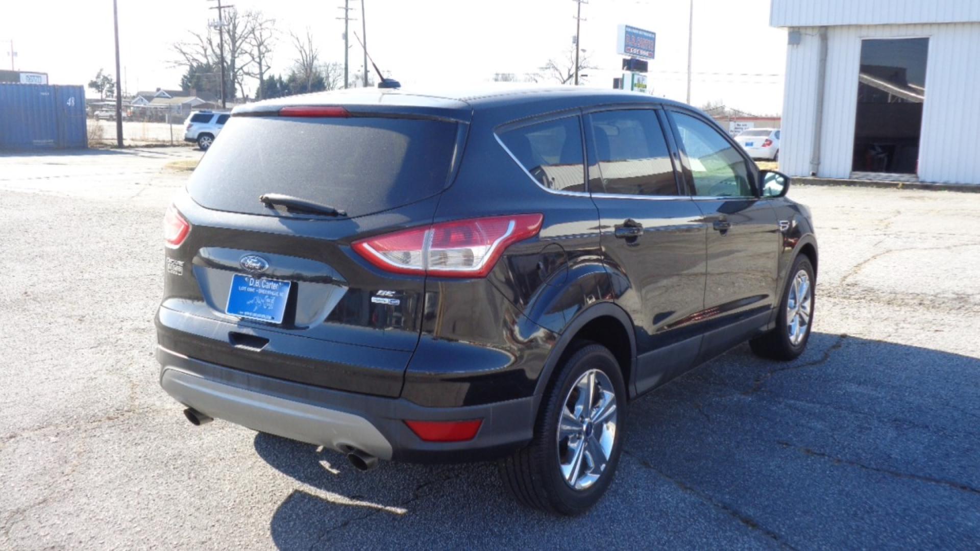 2014 BLACK /TAN Ford Escape SE 4WD (1FMCU9GX0EU) with an 1.6L L4 DOHC 16V engine, 6-Speed Automatic transmission, located at 2812 White Horse Road, Greenville, SC, 29611, (864) 269-1711, 34.808655, -82.434776 - Photo#3