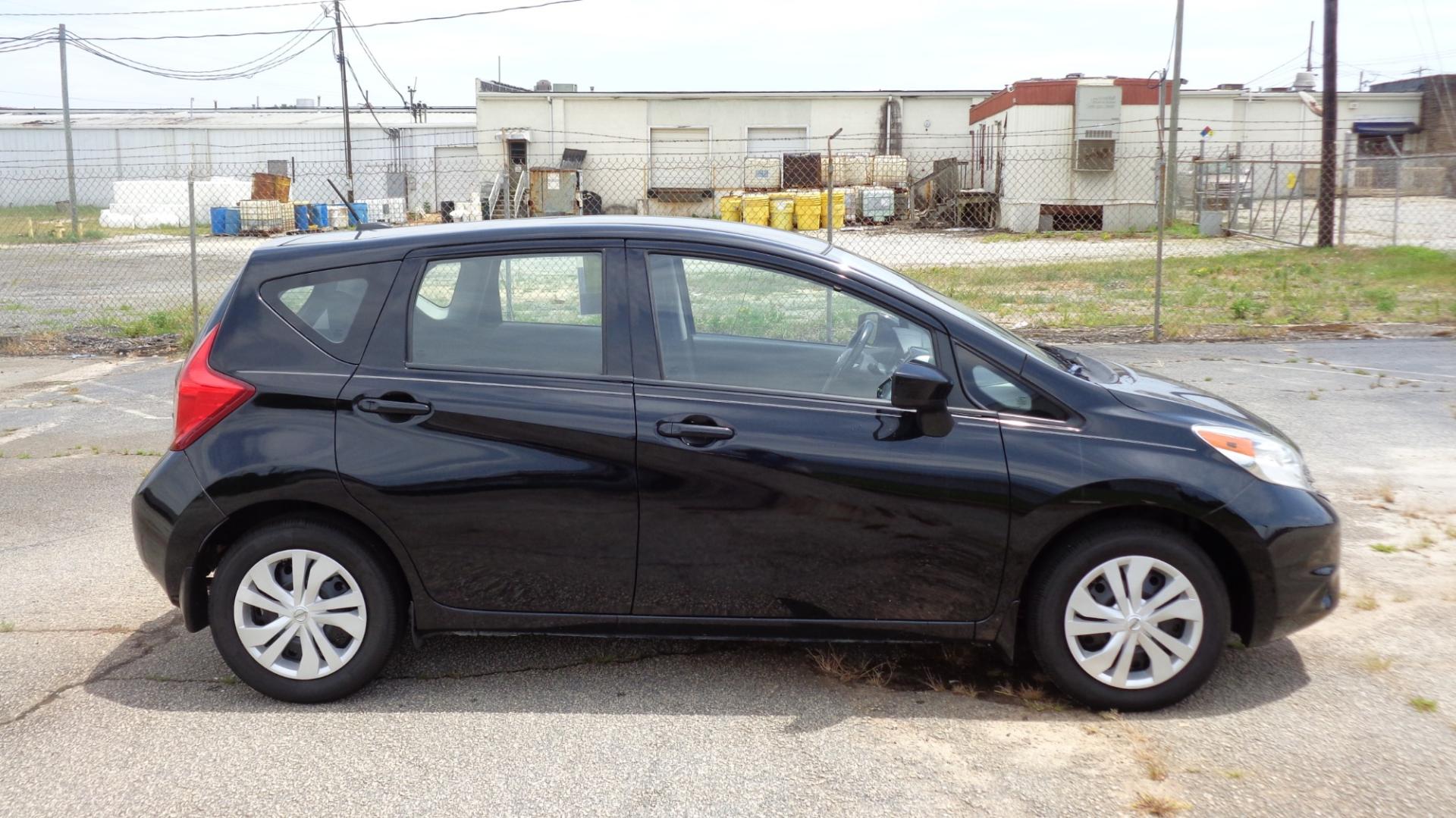 2016 BLACK /BLACK Nissan Versa Note S (3N1CE2CPXGL) with an 1.6L L4 DOHC 16V engine, 5M transmission, located at 2812 White Horse Road, Greenville, SC, 29611, (864) 269-1711, 34.808655, -82.434776 - 1.6 LITER 4 CYLINDER ENGINE, 15 INCH WHEELS,ANTI LOCK BRAKES,ANTI THEFT SYSTEM,TILT STEERING,A/C,DUAL AIRBAGS,FRONT SIDE AIRBAGS,BODY COLOR BUMPERS,MIRRORS,AND DOOR HANDLES,FRONT/REAR READING LIGHTS,CRUISE CONTROL,USB/AUX OUTLET,VANITY MIRRORS,TRACTION CONTROL,POWER MIRRORS,WINDOWS,AND DOOR LOCKS,RA - Photo#2