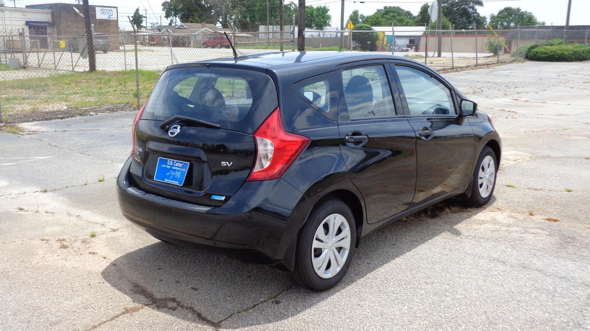 2016 BLACK /BLACK Nissan Versa Note S (3N1CE2CPXGL) with an 1.6L L4 DOHC 16V engine, 5M transmission, located at 2812 White Horse Road, Greenville, SC, 29611, (864) 269-1711, 34.808655, -82.434776 - 1.6 LITER 4 CYLINDER ENGINE, 15 INCH WHEELS,ANTI LOCK BRAKES,ANTI THEFT SYSTEM,TILT STEERING,A/C,DUAL AIRBAGS,FRONT SIDE AIRBAGS,BODY COLOR BUMPERS,MIRRORS,AND DOOR HANDLES,FRONT/REAR READING LIGHTS,CRUISE CONTROL,USB/AUX OUTLET,VANITY MIRRORS,TRACTION CONTROL,POWER MIRRORS,WINDOWS,AND DOOR LOCKS,RA - Photo#3